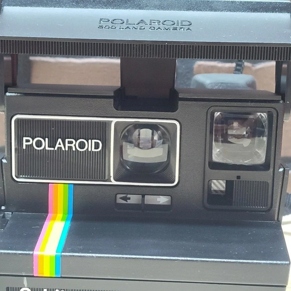 Polaroid please see